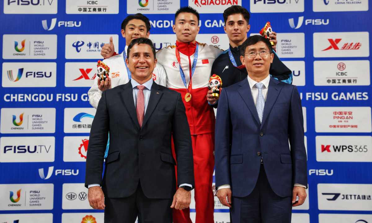 Cao Maoyuan wins the gold medal with 9.770 points in the Men's Nanquan of Wushu at the 31st FISU World University Games on July 29, 2023. This is the first gold medal of the Chengdu Universiade and also the first gold medal won by the Chinese delegation. Photo: Cui Meng/GT