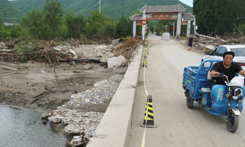 This photo taken on Aug. 5, 2023 shows a view of the Koutou Village of Qinglonghu Town in Fangshan District of Beijing, capital of China. As this round of typhoon-induced torrential rains have come to an end in Beijing, some villagers of Fangshan District, who had been evacuated to settlement sites due to heavy rainfall over the previous few days, returned home on Saturday after experts assessed the safety of their residences.

Beijing has, over the past few days, seen the heaviest rainfall since records began 140 years ago. (Xinhua/Zhang Chenlin)