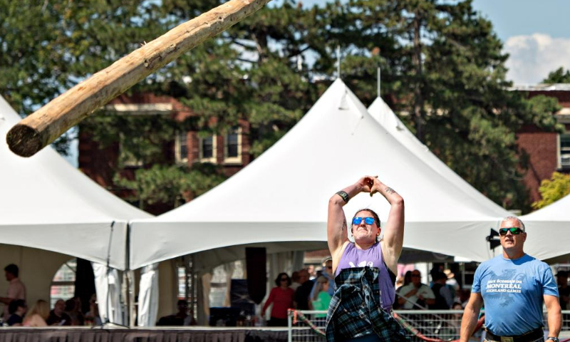 People take part in a toss competition during the 2023 Montreal Highland Games in Montreal, Canada, on Aug. 6, 2023. The 2023 Montreal Highland Games were held here Sunday. The games, held annually during summers since 1855, feature traditional Scottish events that include pipe bands, athletes and Highland dancers. (Photo by Andrew Soong/Xinhua)