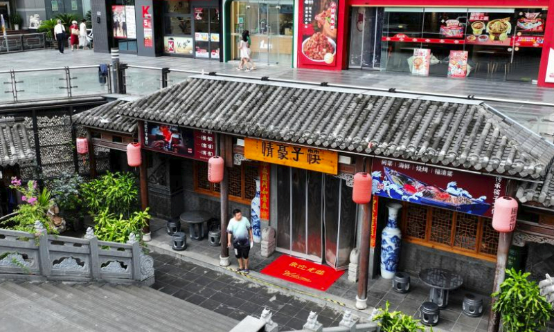 Shops resume business after typhoon Doksuri passed by Fuzhou, southeast China's Fujian Province, July 30, 2023. Fuzhou has seen its urban life gradually back to normal after typhoon Doksuri swept through the city. (Xinhua/Wei Peiquan)