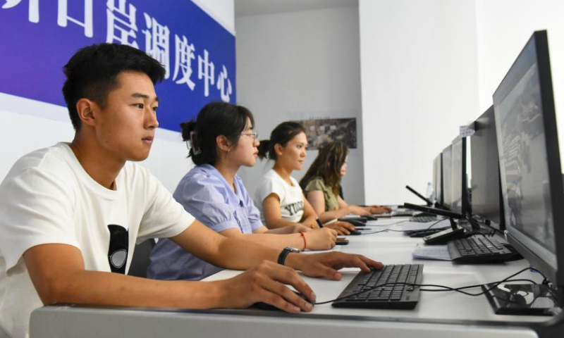 Staff members work at the control center of Horgos Port in northwest China's Xinjiang Uygur Autonomous Region, July 26, 2023.

More and more domestically-made automobiles have been exported through the Horgos Port, one of China's closest ports to Central Asia and Europe by land transport, to countries along the Belt and Road, including Kazakhstan, Uzbekistan and Russia. (Xinhua/Ding Lei)