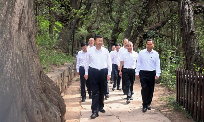 General Secretary of the Communist Party of China Central Committee Xi Jinping, also Chinese president and chairman of the Central Military Commission, visits the site of a section of an ancient road system known as Shudao in Guangyuan City, southwest China's Sichuan Province, July 25, 2023.(Photo: Xinhua)