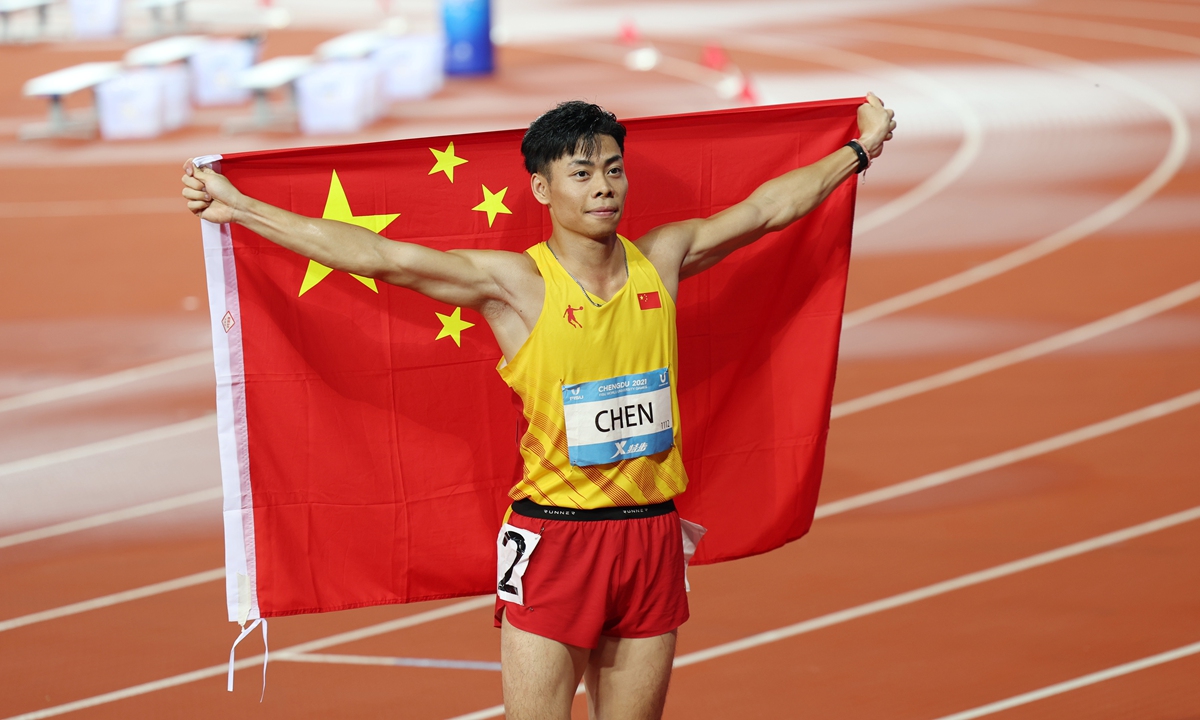 Chen Guanfeng celebrates winning bronze in the men's 100 meters final on August 2, 2023. Photo: Cui Meng/Global Times
