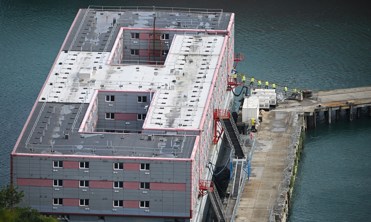 Workers load supplies on to the Bibby Stockholm immigration barge on August 02, 2023, in Portland, UK. The UK Home Office hopes to accommodate 500 migrants aboard the Bibby Stockholm barge in Portland, Dorset, while their asylum claims are processed. The first 50 asylum seekers were initially scheduled to board the barge in July. However, the move was delayed due to fire safety concerns. Photo: VCG 