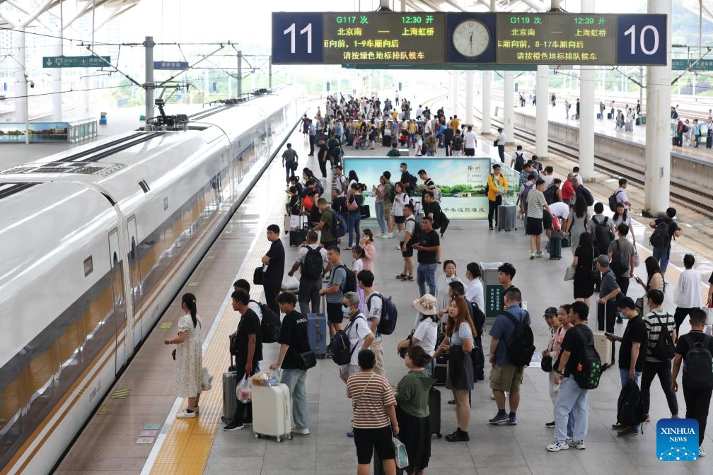 Passengers wait to board trains at Xuzhou East Railway Station in Xuzhou, east China's Jiangsu Province, Aug. 1, 2023. China's railways recorded 406 million passenger trips from July 1 to 31, according to data revealed on Tuesday by China State Railway Group Co., Ltd., the country's railway operator. During this period, daily passenger trips averaged 13.1 million, while 10,169 trains were operating daily, up 14.2 percent compared to the same period in 2019, according to the company.(Photo: Xinhua)