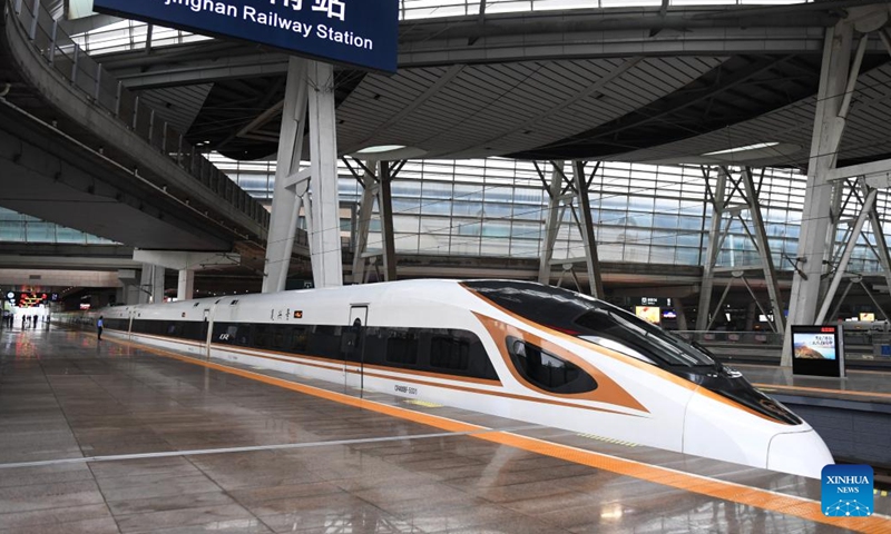 A train operating on the Beijing-Tianjin Intercity Railway leaves the Beijing South Railway Station in Beijing, capital of China, Aug. 1, 2023. The Beijing-Tianjin Intercity Railway celebrated its 15th anniversary of opening Tuesday. As the first high-speed railway (HSR) with a design speed of 350 km per hour in China, the Beijing-Tianjin Intercity Railway carried a total of 340 million passengers since it entered operation.(Photo: Xinhua)