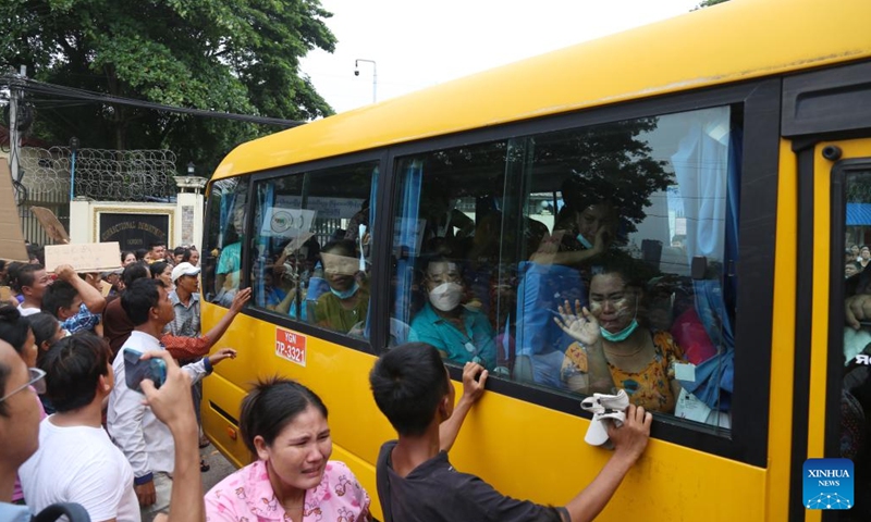 Prisoners who have been granted pardons leave the Insein Prison in Yangon, Myanmar, Aug. 1, 2023.(Photo: Xinhua)