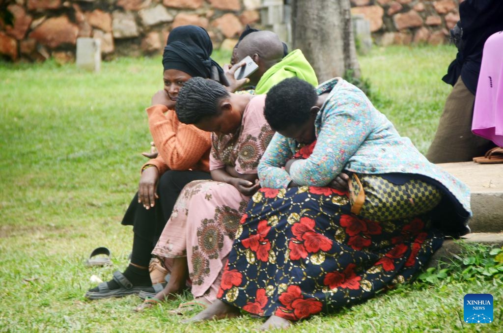 Relatives of victims of a boat capsizing accident wait at Kasenyi landing site, Wakiso District, Uganda, Aug. 3, 2023. At least 20 people were killed after a boat capsized in Lake Victoria in central Uganda, police said Wednesday. (Photo: Xinhua)