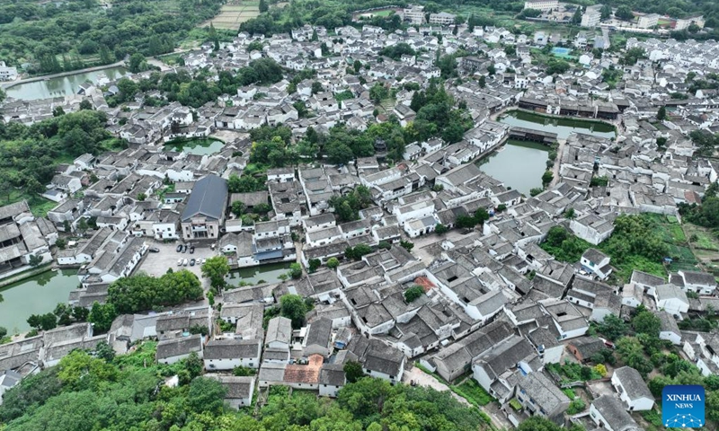 This aerial photo taken on Aug. 1, 2023 shows the Zhuge Village of Lanxi City, east China's Zhejiang Province. The Zhuge Village, a historic gem with over 300 ancient buildings dating back to Ming and Qing dynasties (1368-1911), is home to descendents of Zhuge Liang, a renowned military strategist in the Three Kingdom Period (220-280). The village has made concerted efforts to preserve the ancient heritages and develop tourism, receiving over 500,000 visitors annually.(Photo: Xinhua)