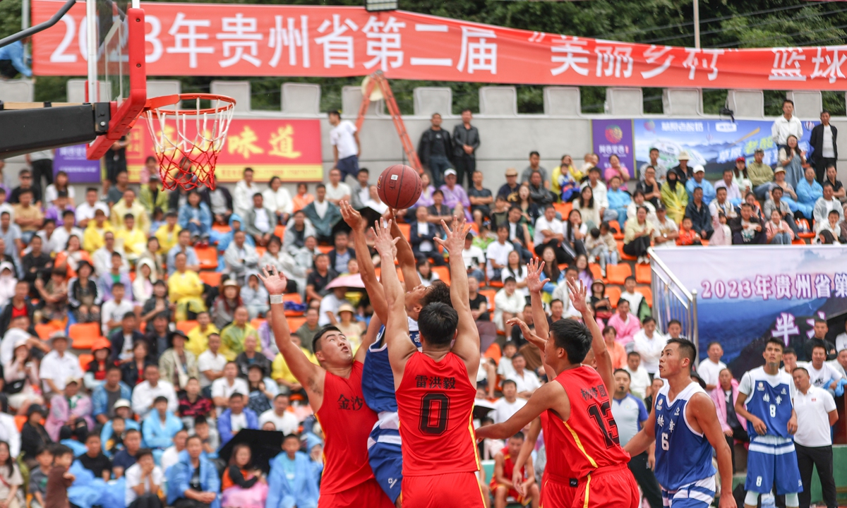 Villagers crowd the venue despite rain to watch the semi-final game of the Village BA,  China's hottest grassroots basketball game, on August 6, 2023, in Bijie, Southwest China's Guizhou Province. The tournament has become phenomenal since last year. Photo: VCG