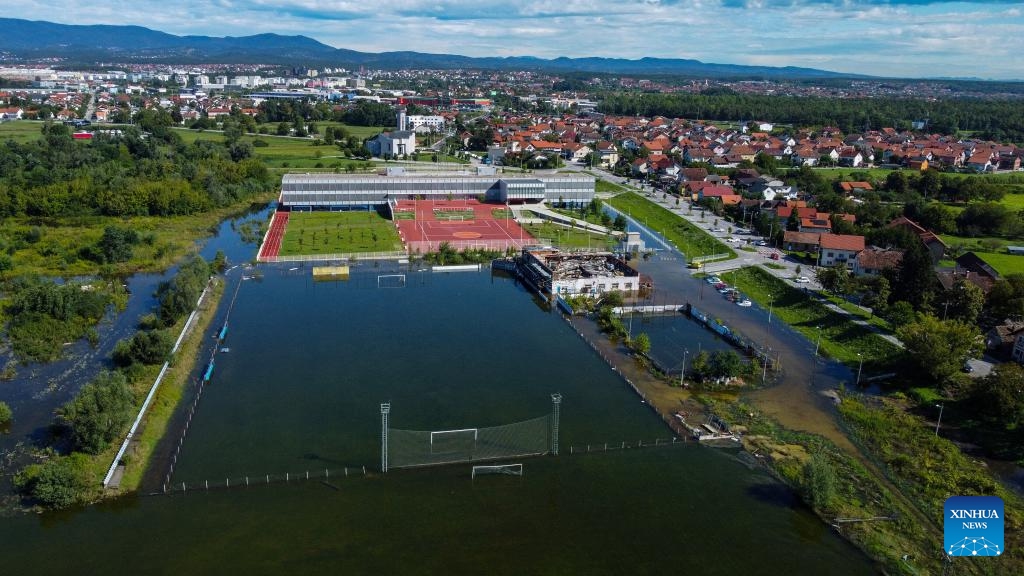 This aerial photo taken on Aug. 7, 2023 shows a flooded football court as River Sava overflows because of heavy rainfall at Ivanja Reka in Zagreb, Croatia.(Photo: Xinhua)