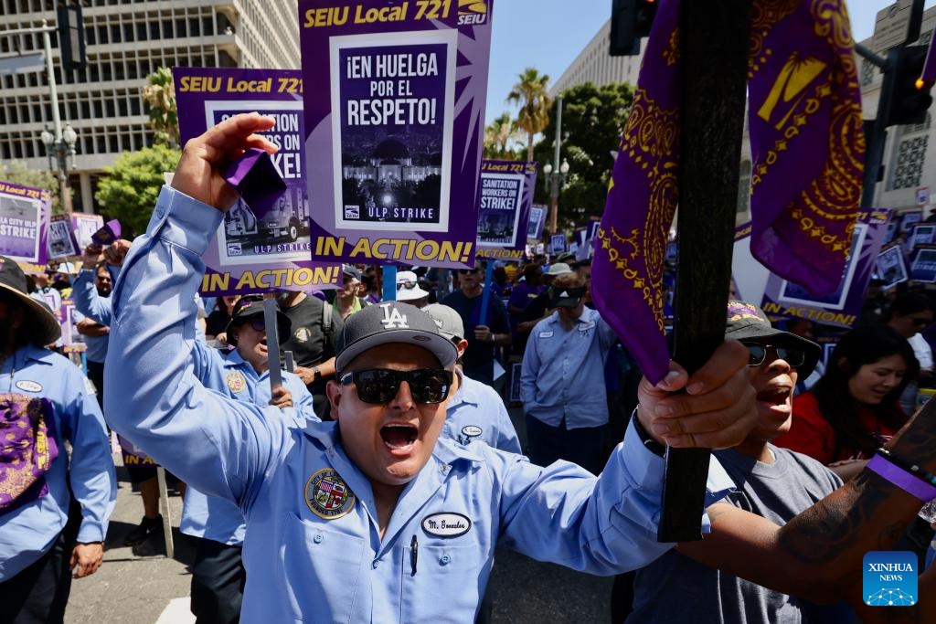 City workers go on strike in front the Los Angeles City Hall in Los Angeles, the United States, on Aug. 8, 2023. More than 11,000 city workers in Los Angeles, the second largest city in the United States, are walking off their job on Tuesday for a 24-hour strike.(Photo: Xinhua)