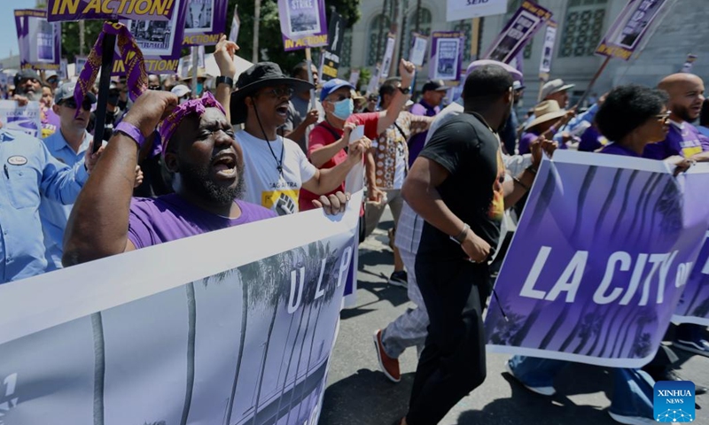 City workers go on strike in front the Los Angeles City Hall in Los Angeles, the United States, on Aug. 8, 2023. More than 11,000 city workers in Los Angeles, the second largest city in the United States, are walking off their job on Tuesday for a 24-hour strike.(Photo: Xinhua)