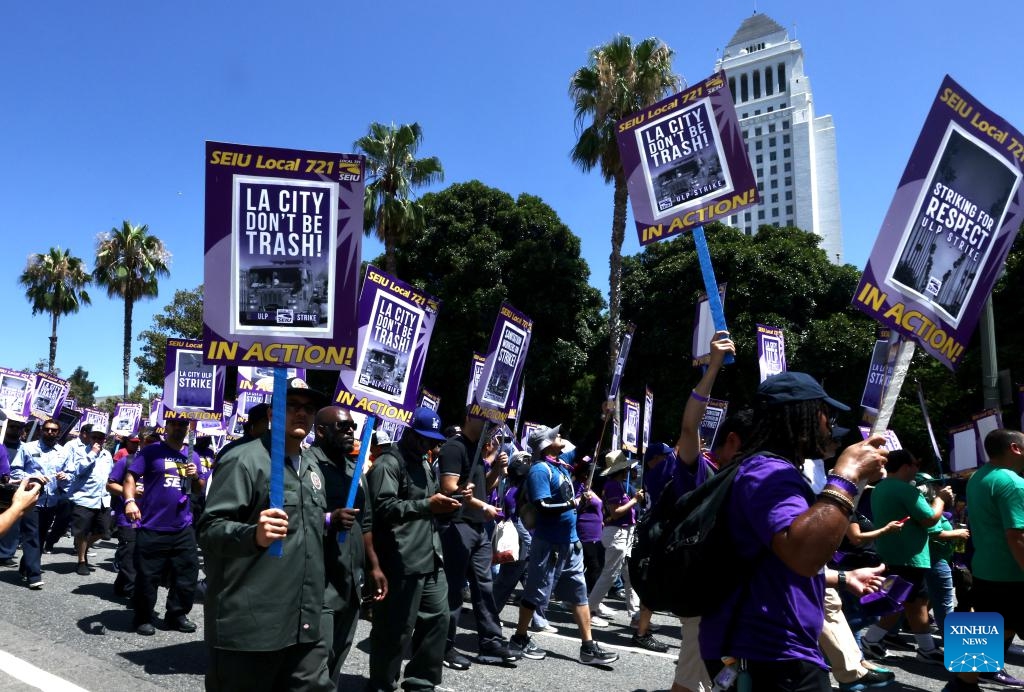 City workers go on strike in front the Los Angeles City Hall in Los Angeles, the United States, on Aug. 8, 2023. More than 11,000 city workers in Los Angeles, the second largest city in the United States, are walking off their job on Tuesday for a 24-hour strike.(Photo: Xinhua)