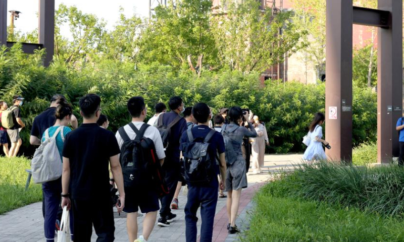 Journalists attend a media preview of the 2023 China International Fair for Trade in Services (CIFTIS) at Shougang Park in Beijing, capital of China, Aug. 13, 2023. The 2023 CIFTIS will be held at the China National Convention Center and Shougang Park in Beijing from Sept. 2 to Sept. 6. (Xinhua/Chen Shuo)