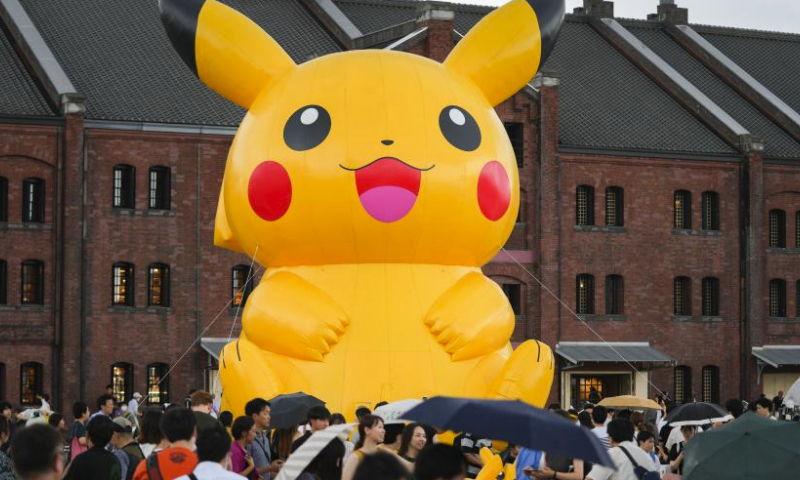 An inflatable Pikachu is seen at Minatomirai in Yokohama, Japan, Aug. 13, 2023. To commemorate the launch of the 2023 Pokemon World Championships, a Pokemon festival is held in Yokohama's Minatomirai from Aug.11 to Aug.14. (Xinhua/Zhang Xiaoyu)