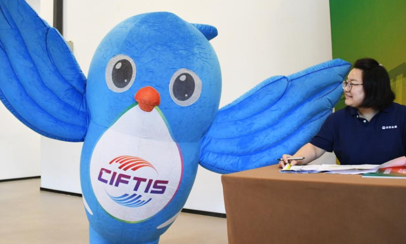 The mascot FuYan for the 2023 China International Fair for Trade in Services (CIFTIS) is seen at Shougang Park in Beijing, capital of China, Aug. 13, 2023. The 2023 CIFTIS will be held at the China National Convention Center and Shougang Park in Beijing from Sept. 2 to Sept. 6. (Xinhua/Ren Chao)