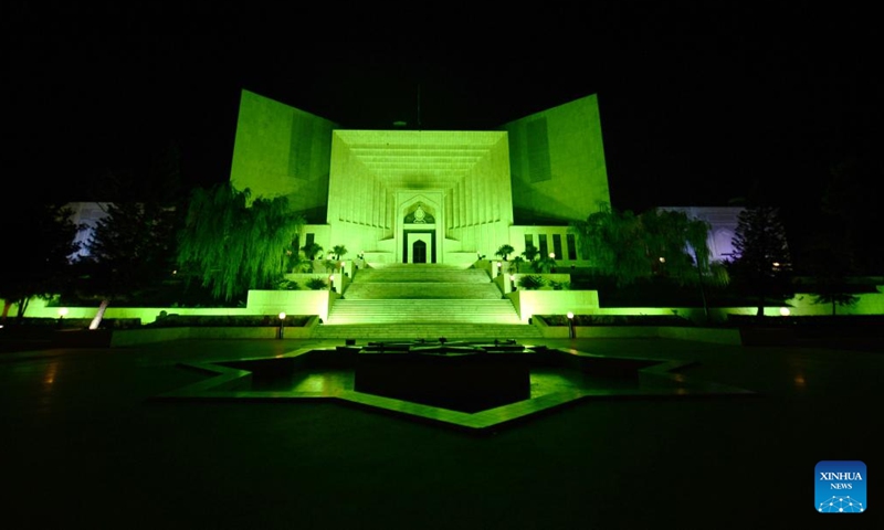 This photo taken on Aug. 13, 2023 shows illuminated building of Supreme Court of Pakistan on the eve of Pakistan's Independence Day in Islamabad, capital of Pakistan. Pakistan will celebrate its Independence Day on Aug. 14.(Photo: Xinhua)
