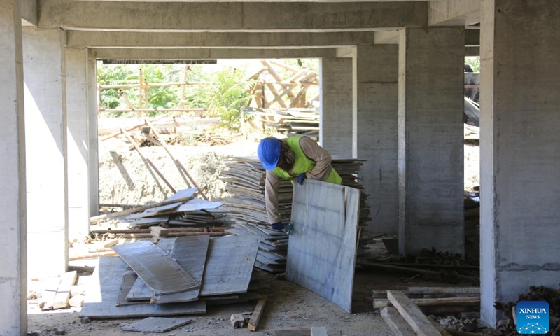 An Afghan employee works at the construction site of a China-funded housing complex in Kabul, Afghanistan, Aug. 13, 2023.(Photo: Xinhua)