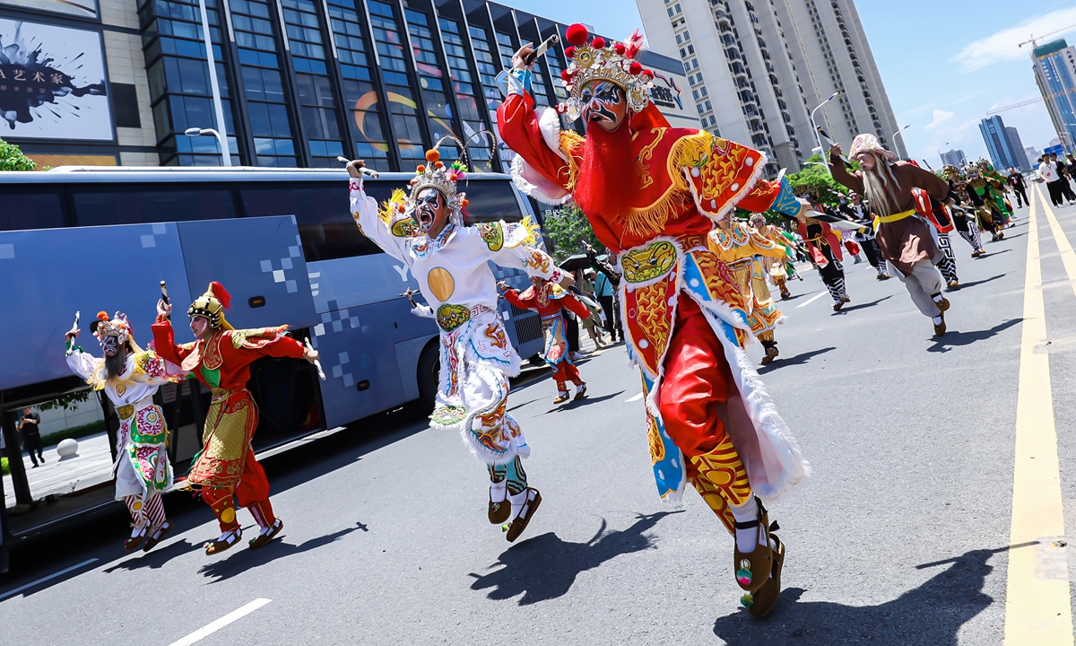 Dancers perform the Yingge Dance on August 16, 2023 in Shantou, South China's Guangdong Province, before the opening of the China Digital Economy Innovation and Development Conference. Yingge Dance, literally the Songs of Heroes dance, is a traditional folk dance that originated from the Chaoshan area of Guangdong. Photo: VCG