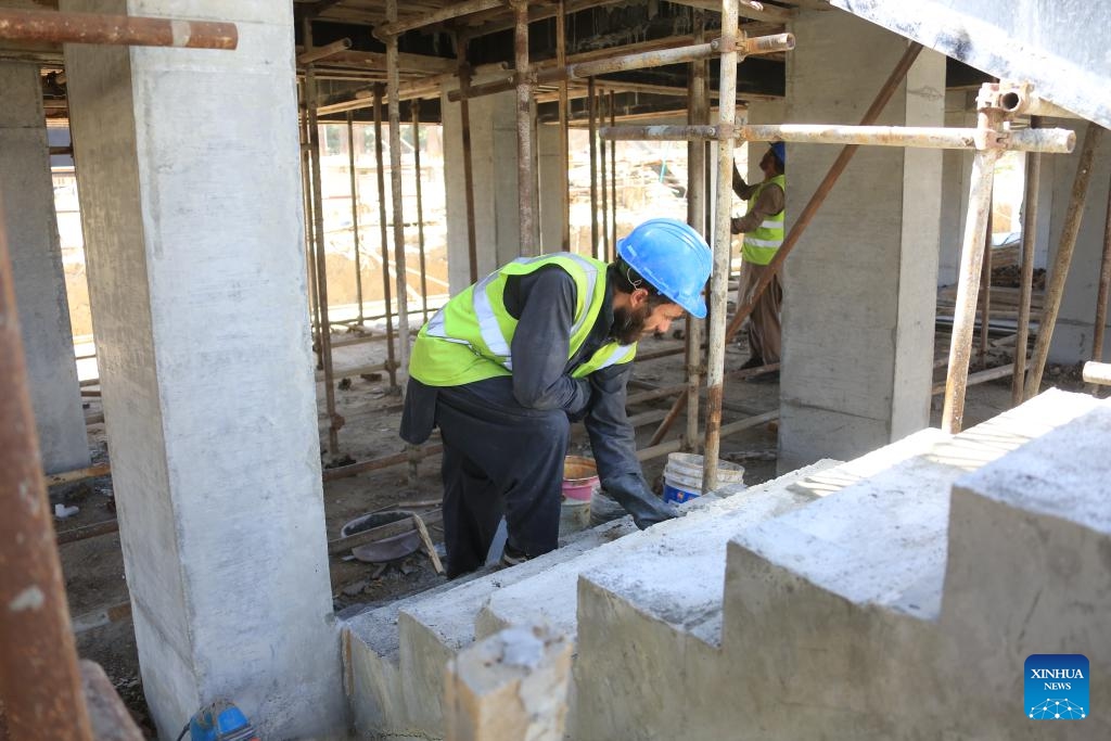 An Afghan employee works at the construction site of a China-funded housing complex in Kabul, Afghanistan, Aug. 13, 2023.(Photo: Xinhua)