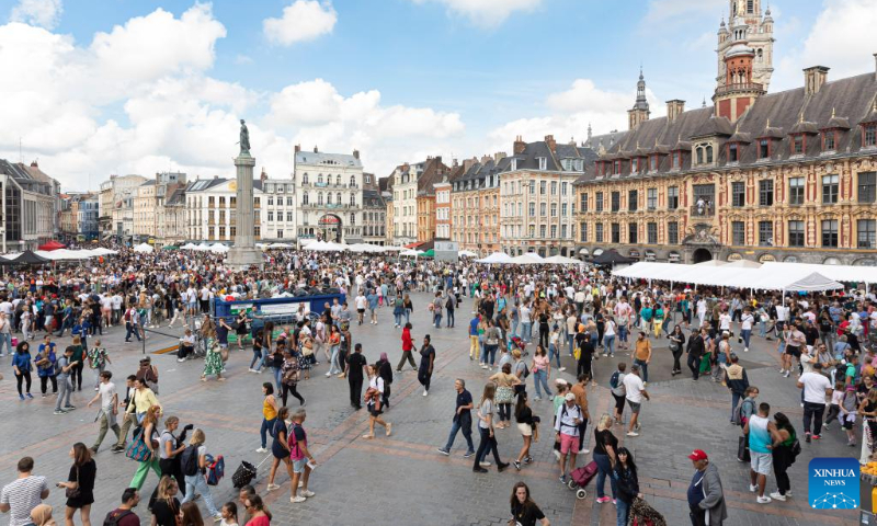 People visit the annual Braderie de Lille (Lille flea market), in Lille, northern France, Sept. 2, 2023. The annual Braderie de Lille kicked off here on the first weekend of September. (Photo by Sebastien Courdji/Xinhua)