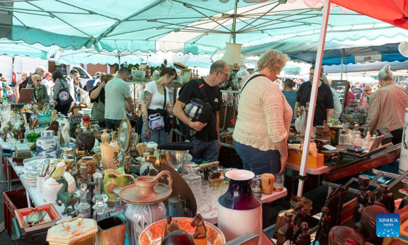 People look at items during the annual Braderie de Lille (Lille flea market), in Lille, northern France, Sept. 2, 2023. The annual Braderie de Lille kicked off here on the first weekend of September. (Photo by Sebastien Courdji/Xinhua)