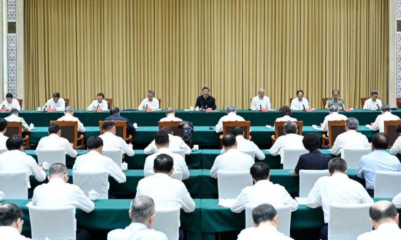 Chinese President Xi Jinping, also general secretary of the Communist Party of China Central Committee and chairman of the Central Military Commission, delivers a speech when he is briefed about the work of the Party committee and government of northwest China's Xinjiang Uygur Autonomous Region, as well as the Xinjiang Production and Construction Corps, in Urumqi, northwest China's Xinjiang Uygur Autonomous Region, Aug. 26, 2023. (Xinhua/Shen Hong)