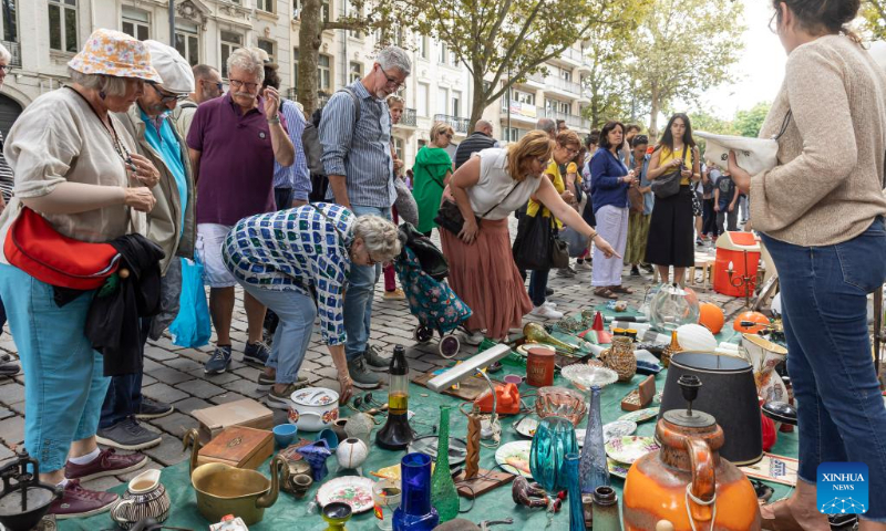 People visit the annual Braderie de Lille (Lille flea market), in Lille, northern France, Sept. 2, 2023. The annual Braderie de Lille kicked off here on the first weekend of September. (Photo by Sebastien Courdji/Xinhua)