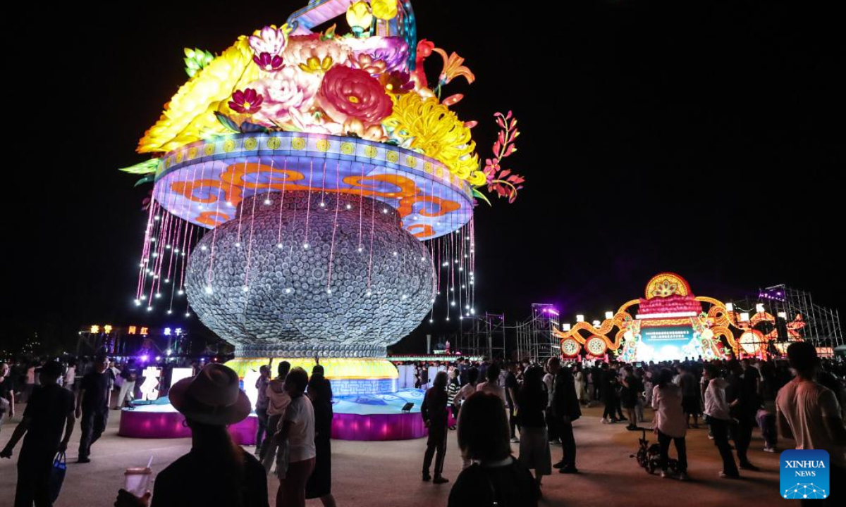 People watch a lantern show at the Liaohe wetland park in Panjin, northeast China's Liaoning Province, Sep 1, 2023. Hundreds of light installations were displayed at the lantern show. Photo:Xinhua