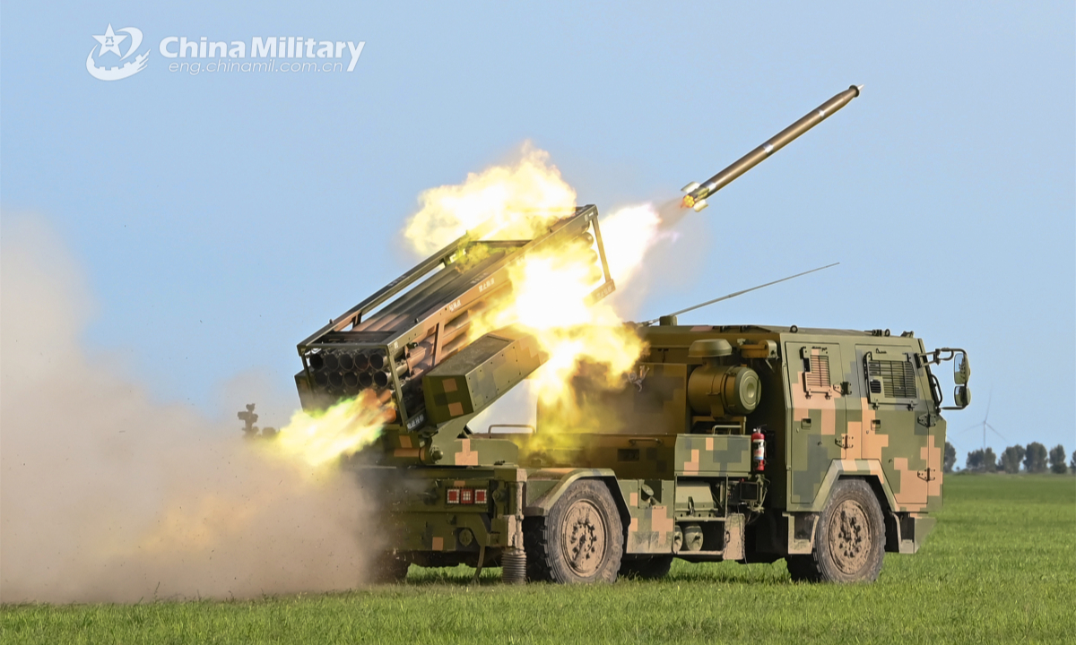 A long-range multiple rocket launcher system (MRLS) attached to a brigade under the PLA 78th Group Army fires at mock targets during a live-fire training exercise in late July, 2023. Photo:China Military