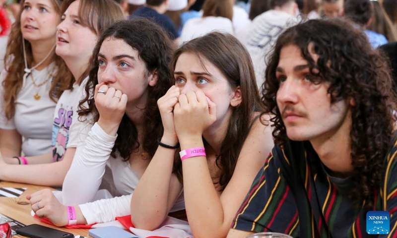 Fans watch the live broadcast of the 2023 FIFA Women's World Cup final match between Spain and England in London, Britain, Aug. 20, 2023. Photo: Xinhua