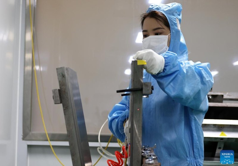 A worker works at the workshop of an electronic products company in Zhuozhou City, north China's Hebei Province, Aug. 19, 2023. At present, the post-disaster recovery and reconstruction work is intensively carried out in Zhuozhou City. The local government has been speeding up the repair of infrastructure and assisting enterprises to resume production. (Xinhua/Luo Xuefeng)