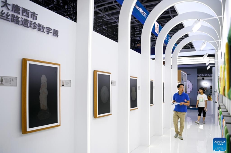 Visitors visit the digital culture exhibition area at the 10th West China Culture Industries Expo in Xi'an, northwest China's Shaanxi Province, Aug. 18, 2023. The 10th West China Culture Industries Expo opened on Thursday in Xi'an and will last till Aug. 20. Photo: Xinhua