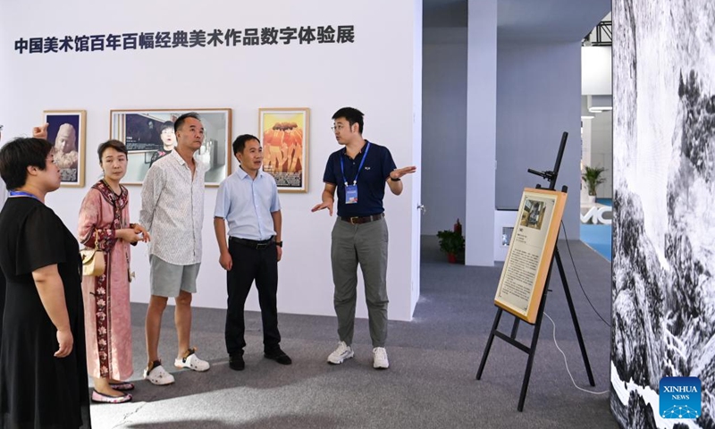 Visitors visit the digital culture exhibition area at the 10th West China Culture Industries Expo in Xi'an, northwest China's Shaanxi Province, Aug. 18, 2023. The 10th West China Culture Industries Expo opened on Thursday in Xi'an and will last till Aug. 20. Photo: Xinhua