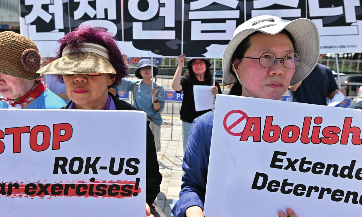 Anti-war activists hold a rally to protest against the US-South Korea Ulchi Freedom Shield joint military exercises, near the Presidential Office in Seoul on August 21, 2023. Photo: AFP