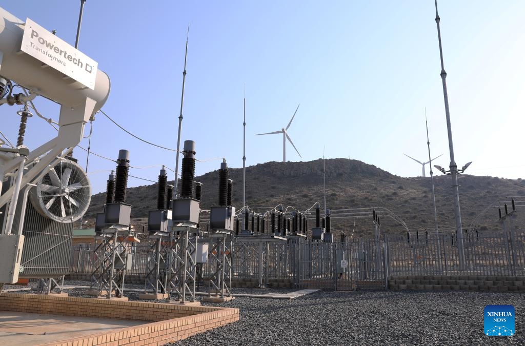 This photo taken on Aug. 10, 2023 shows a substation and wind turbines of (Longyuan SA) De Aar Wind Power Project in De Aar, South Africa.(Photo: Xinhua)