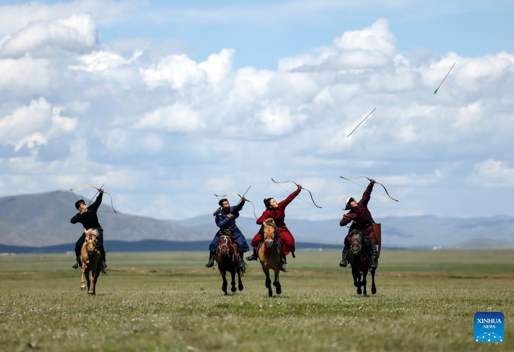 Participants perform riding and archery during a nomadic culture festival in the Nalaikh District of Ulan Bator, Mongolia, Aug. 19, 2023. A cultural festival to promote Mongolia's nomadic intangible culture and the development of the tourism sector was held from Aug. 18 to 20 in the Nalaikh District of Ulan Bator.(Photo: Xinhua)