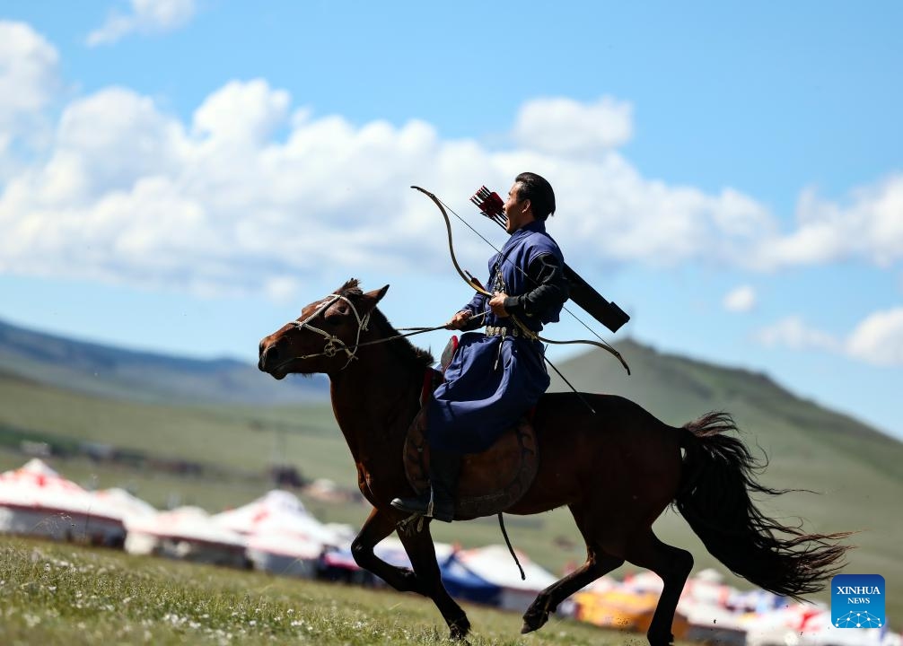 A horseman performs riding during a nomadic culture festival in the Nalaikh District of Ulan Bator, Mongolia, Aug. 19, 2023. A cultural festival to promote Mongolia's nomadic intangible culture and the development of the tourism sector was held from Aug. 18 to 20 in the Nalaikh District of Ulan Bator.(Photo: Xinhua)