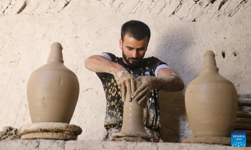 A potter makes pottery in Balkh Province, Afghanistan, Aug. 23, 2023.(Photo: Xinhua)