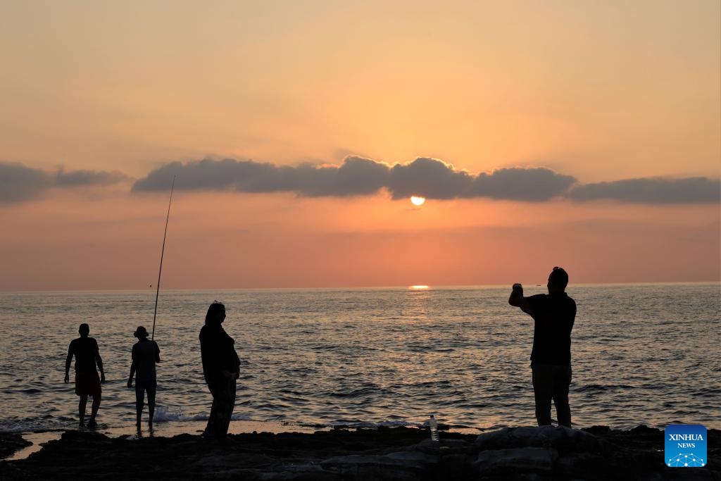 The sunset is seen in the Mediterranean Sea in Beirut, Lebanon, on Aug. 23, 2023.(Photo: Xinhua)