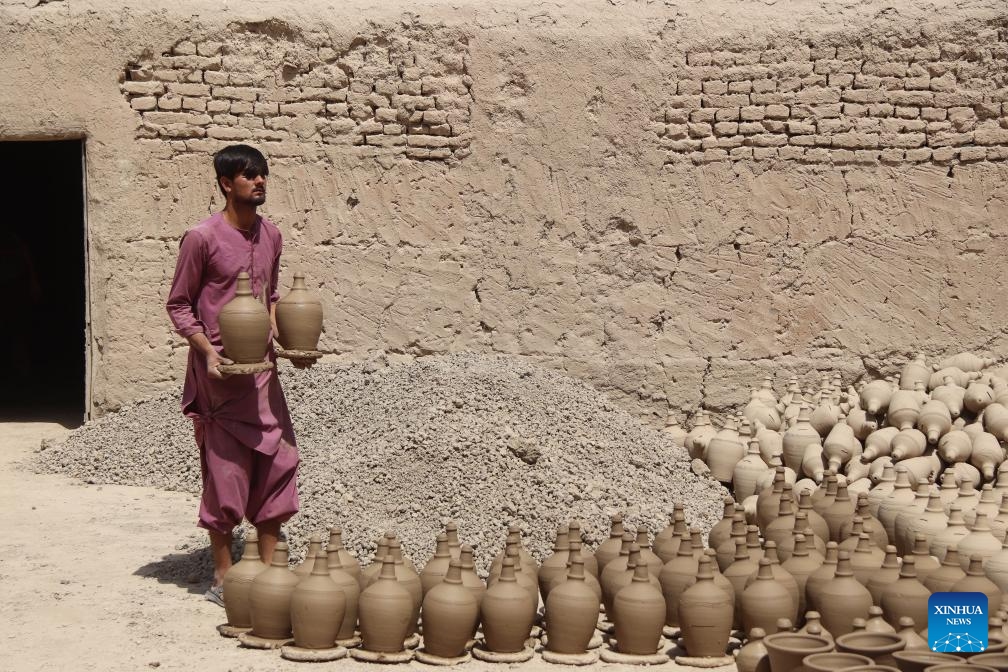 A potter works at a pottery making workshop in Balkh Province, Afghanistan, Aug. 23, 2023.(Photo: Xinhua)