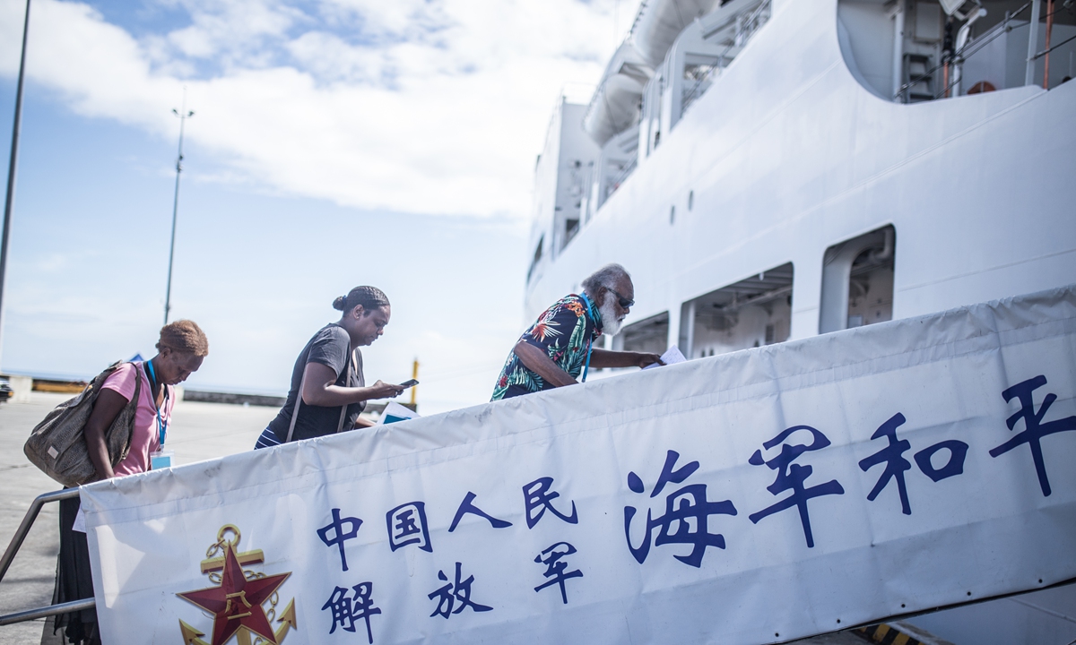 Local residents board the <em>Ark Peace</em> on August 20, 2023 in Honiara Photo: Shan Jie/GT