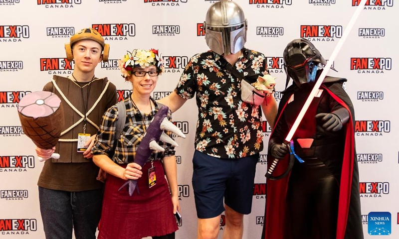 Cosplayers pose for photos during the 2023 Fan Expo Canada in Toronto, Canada, on Aug. 25, 2023. As one of the largest comics, sci-fi, anime and gaming events in Canada, the annual event is held here from Aug. 24 to Aug. 27, attracting hundreds of thousands of fans from across the world. Photo: Xinhua