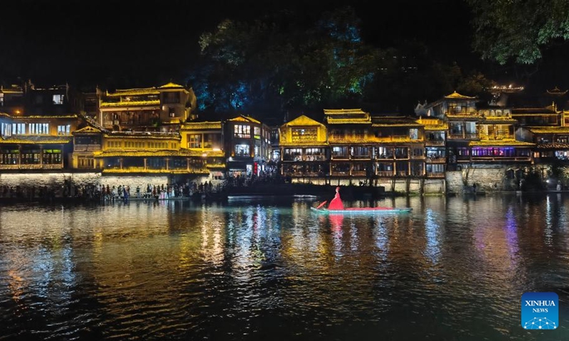 This photo taken on Aug. 25, 2023 shows a night view at Fenghuang ancient town in Xiangxi Tujia and Miao Autonomous Prefecture, central China's Hunan Province. Photo: Xinhua