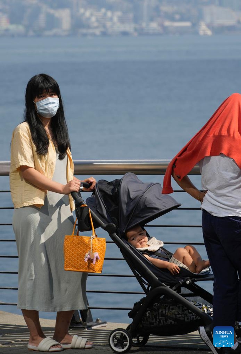 A citizen wearing a face mask is seen at the waterfront in haze in downtown Vancouver, British Columbia, Canada, Aug. 26, 2023. The Metro Vancouver continued an air quality advisory for the metro Vancouver region on Saturday due to high concentration of fine particulate matter caused by smoke from wildfires spreading across British Columbia. Photo: Xinhua