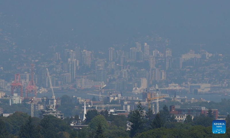 Buildings are shrouded in haze in downtown Vancouver, British Columbia, Canada, Aug. 26, 2023. The Metro Vancouver continued an air quality advisory for the metro Vancouver region on Saturday due to high concentration of fine particulate matter caused by smoke from wildfires spreading across British Columbia. Photo: Xinhua