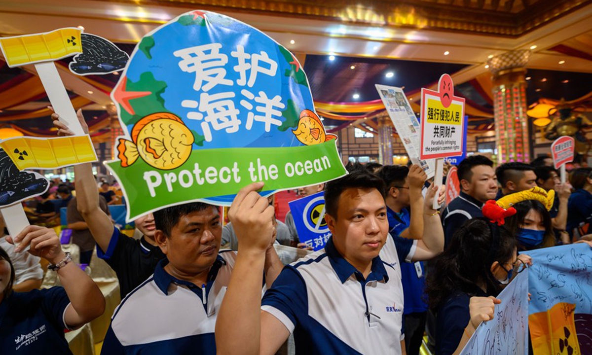 People attend a rally against Japan's dumping of nuclear-contaminated wastewater into the ocean in Selangor state, Malaysia, on Aug. 27, 2023. (Photo by Chong Voon Chung/Xinhua)



