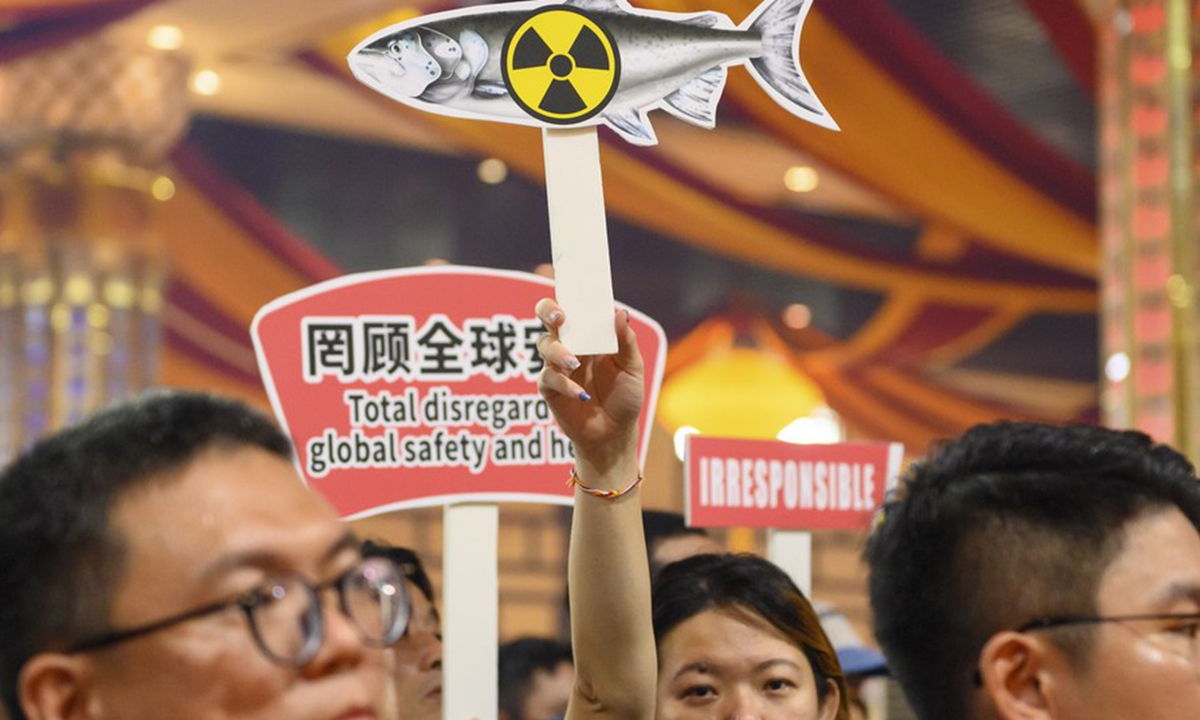 People attend a rally against Japan's dumping of nuclear-contaminated wastewater into the ocean in Selangor state, Malaysia, on Aug. 27, 2023. (Photo by Chong Voon Chung/Xinhua)



