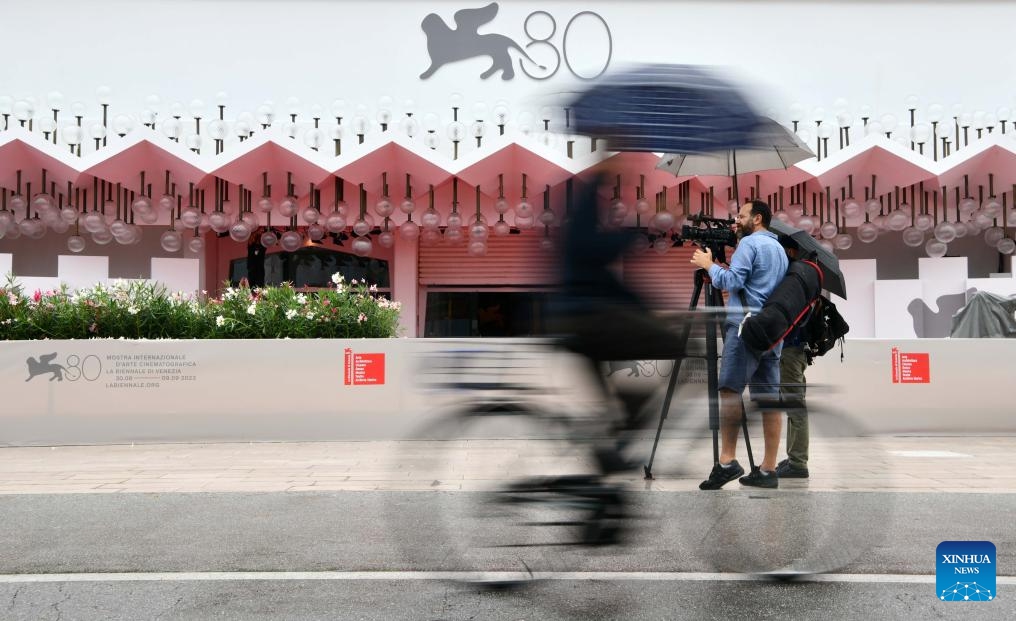 People are seen in front of the Palazzo del Cinema in Venice, Italy, on Aug. 29, 2023. The 80th Venice International Film Festival will kick off here on Aug. 30.(Photo: Xinhua)